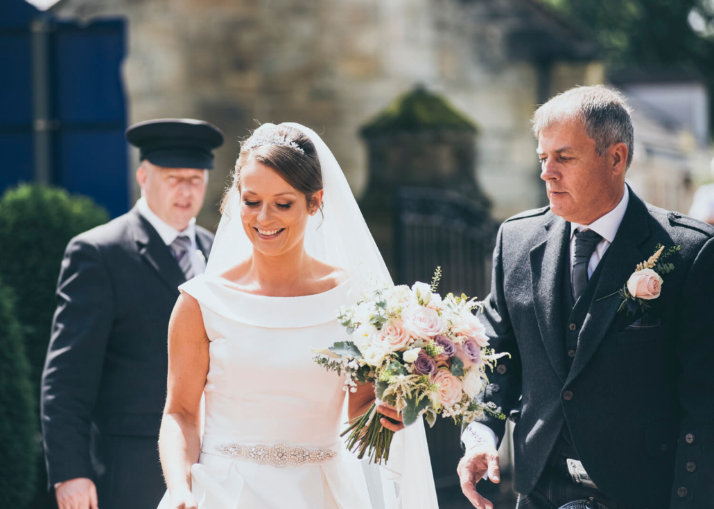 Bride arriving at church by Glasgow wedding photographer Richard Campbell