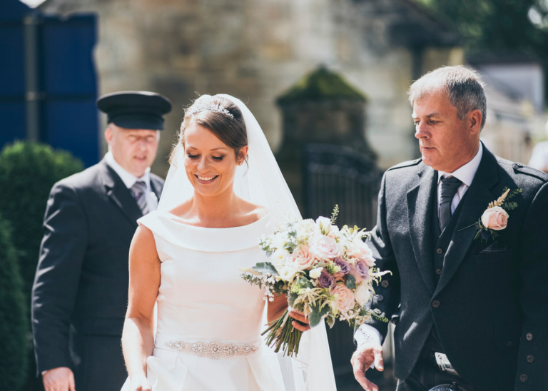 Bride arriving at church by Glasgow wedding photographer Richard Campbell
