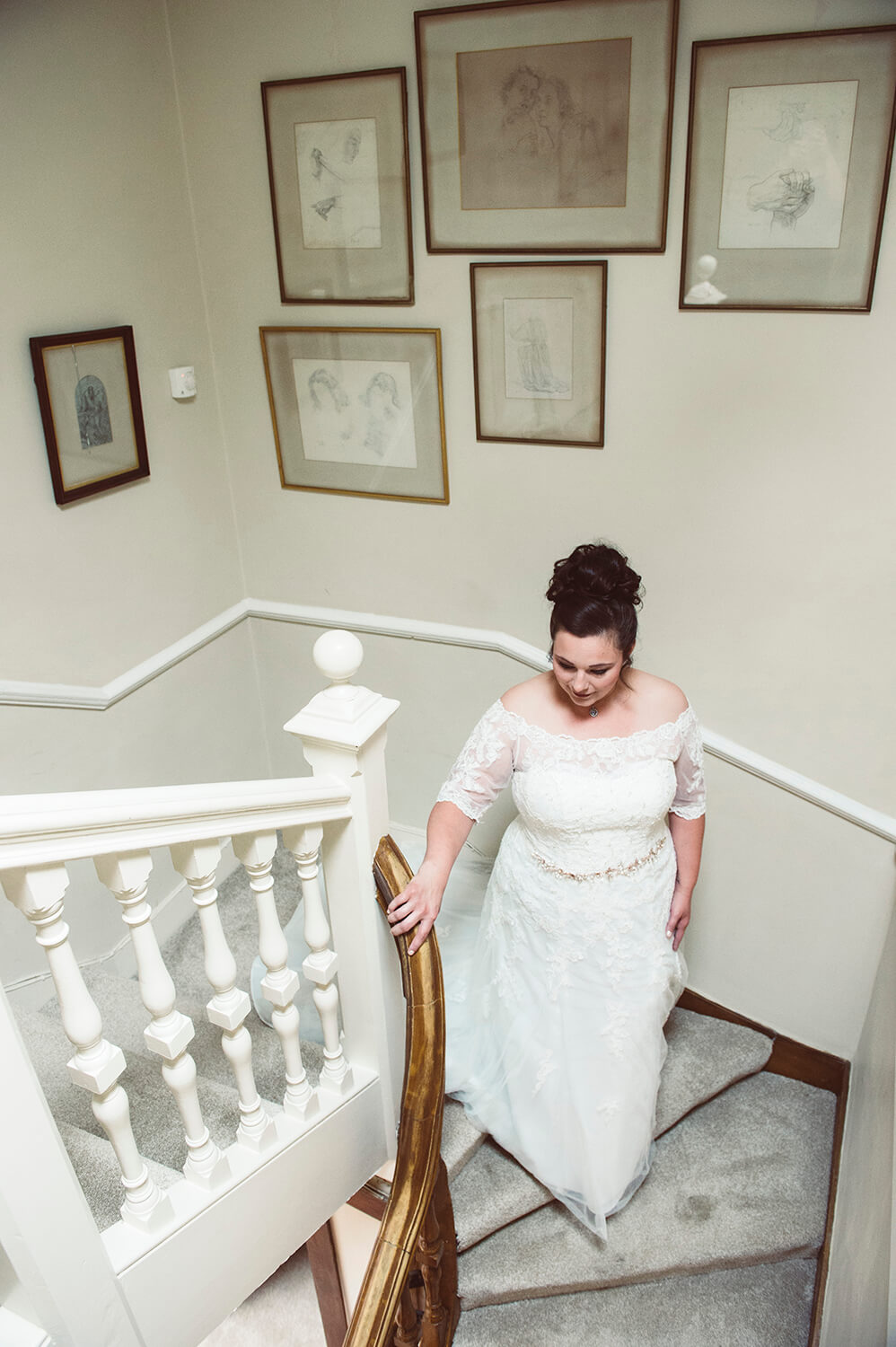Bride on staircase by Glasgow wedding photographer Richard Campbell
