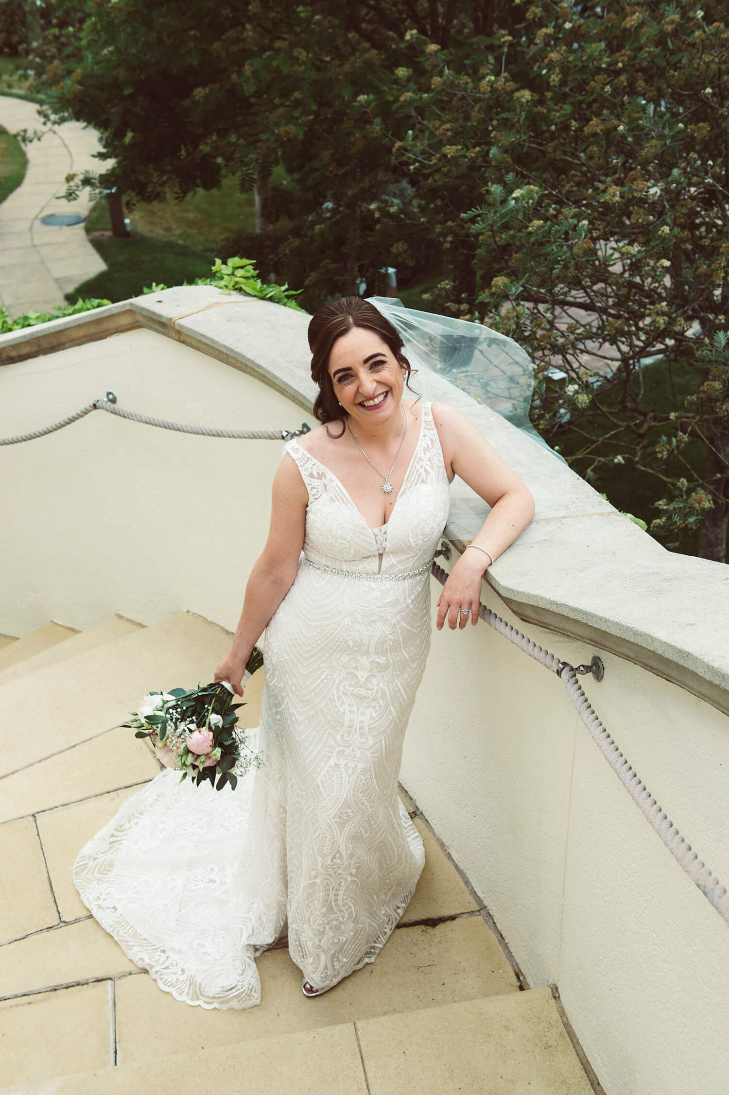 Relaxed portrait of bride at the Gailes Hotel, Ayrshire by wedding photographer Richard Campbell
