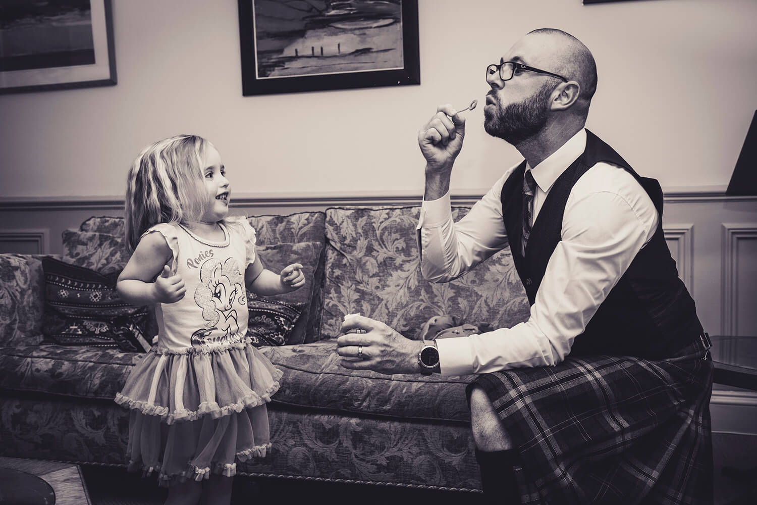 Groom blowing bubbles by Ayrshire Wedding Photographer Richard Campbell